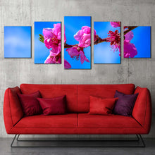 Load image into Gallery viewer, Flowers Branch Canvas Wall Art Blue Sky Blossom Digital Painting 4 Piece Canvas Print Pink Floral Canvas Set In Living room
