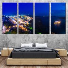 Load image into Gallery viewer, Greece Cityscape Canvas Wall Art Yellow Santorini Island City Lights  4 Piece Canvas Print Dramatic Blue Clouds Night Seascape Canvas Set For Bedroom
