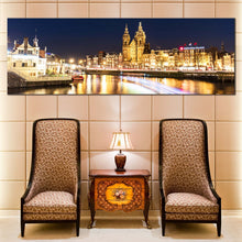 Load image into Gallery viewer, Harbors  City  Canvas  Wall  Art  Blue  Sky  Amsterdam  Centraal  Damrak  Canvas  Artwork  Yellow  City  Lights  Reflection  Canal  Living  Room  1  Piece  Canvas  Print For Living Room
