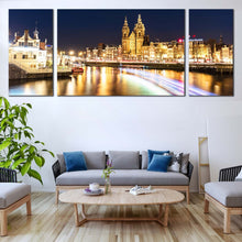 Load image into Gallery viewer, Harbors  City  Canvas  Wall  Art  Blue  Sky  Amsterdam  Centraal  Damrak  Canvas  Artwork  Yellow  City  Lights  Reflection  Canal    3  Piece  Canvas  Print For Living Room
