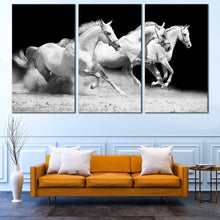 Load image into Gallery viewer, Horses Stallions Canvas Wall Art, Herd Of White Grey Horses 3 Piece Canvas Print, Galloping Horses Triptych Canvas Set In Living Room
