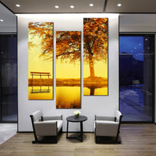 Load image into Gallery viewer, LONE  TREE  bench  river  yellow  blossom  Canvas  Print In Living Room
