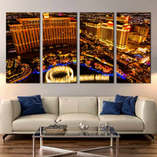 Load image into Gallery viewer, Las Vegas City Skyline At Night 4 panel canvas print In Living room
