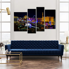 Load image into Gallery viewer, Las Vegas City Skyline At Night 4 piece wall art In Living Room
