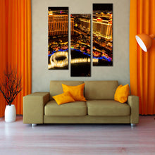 Load image into Gallery viewer, Las  Vegas  City  Skyline  at  Night3  pc.  canvas  artwork In Living Room
