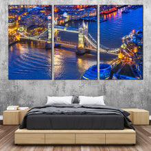 Load image into Gallery viewer, London Bridge Canvas Wall Art Yellow Tower Bridge City Lights Triptych Canvas Print England Blue River Thames 3 Piece Multi Canvas In Bedroom
