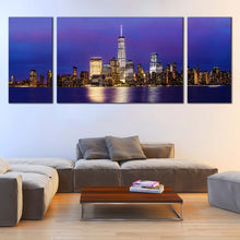 Load image into Gallery viewer, Manhattan Skyline Canvas Wall Art Black New York at Night Canvas Set Downtown Manhattan Blue Purple Sky  3 Piece Canvas Print In Living Room
