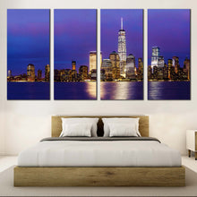 Load image into Gallery viewer, Manhattan Skyline Canvas Wall Art Downtown Manhattan Blue Purple Sky Bedoom 4 Piece Canvas Print In Bedroom
