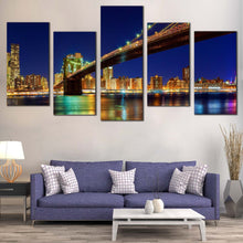 Load image into Gallery viewer, Manhattan Skyline Canvas Wall Art New York Blue Sky  5 Piece Canvas Print Yellow Brooklyn Bridge Night View Canvas In Living Room
