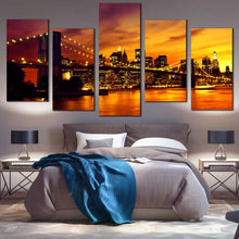 Load image into Gallery viewer, Manhattan Sunset Canvas Wall Art Dramatic Orange Yellow Sky Cityscape Multi Canvas Beautiful New York Brooklyn Bridge  5 Piece Canvas In Bedroom
