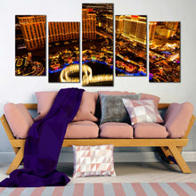 Load image into Gallery viewer, Modern Las Vegas City Skyline At Night 5 panel canvas print In Living Room
