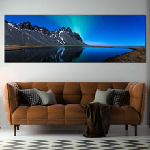 Load image into Gallery viewer, Mountain  Lake  Canvas  Wall  Art  Blue  Sky  Northern  Lights  Canvas  Print  Grey  Coast  Mountain  Water  Reflection  Living  Room  Panoramic  Canvas In Living Room
