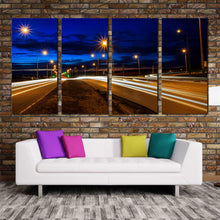 Load image into Gallery viewer, Multi panel Moving car light trail through twilight city roads 4 piece wall art For Your Living Room
