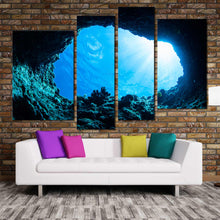 Load image into Gallery viewer, Multi panel deep blue ocean beach cave sunlight 4 piece artwork
