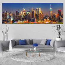 Load image into Gallery viewer, New York Canvas Print Blue Midtown Manhattan Night Cityscape Canvas Artwork Yellow New York City Lights Living Room Panoramic Canvas Wall Art In Living Room
