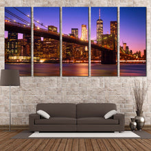 Load image into Gallery viewer, New York Canvas Print Freedom Tower Night Blue Cityscape 5 Piece Multi Canvas Brooklyn Bridge  Canvas Wall Art Brown Manhattan Skyline Canvas Set In Living Room

