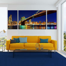 Load image into Gallery viewer, New  York  Canvas  Wall  Art  Yellow  Brooklyn  Bridge  Night  View  Canvas  Blue  Sky  Manhattan  Skyline  Living  Room  3  Piece  Canvas  Print In Living Room

