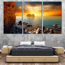Load image into Gallery viewer, Ocean Boulders Canvas Print Blue Sea Ocean Rocks 3 Piece Multi Panel Canvas Yellow Orange Cloudy Sunset Sky Canvas Wall Art For Bedroom
