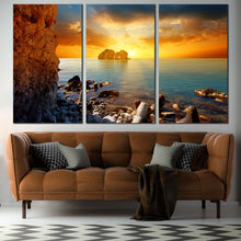 Load image into Gallery viewer, Ocean Rocks Canvas Wall Art Dramatic Yellow Cloudy Sunset Sky Multi Canvas Blue Sea Ocean Boulders  3 Piece Canvas Print For Living Room
