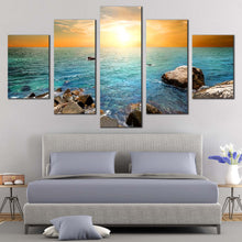 Load image into Gallery viewer, Ocean  Sunset  Canvas  Wall  Art    Blue  Ocean  Rocks  Canvas  Print  Blue  Stony  Beach  5  Piece  Canvas  Yellow  Cloudy  Sky  Canvas  Set In Bedroom
