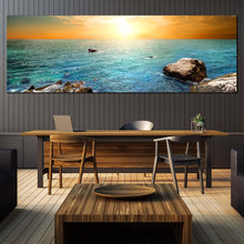 Load image into Gallery viewer, Ocean  Sunset  Canvas  Wall  Art  Blue  Ocean  Rocks  Canvas  Print  Blue  Stony  Beach  Dining  Room  1  Piece  Canvas  Yellow  Cloudy  Sky  Canvas  Set In Dinning Room
