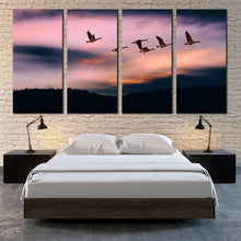 Load image into Gallery viewer, Peaceful birds flying in the sky at sunset over mountains 4 Pieces Canvas print For Your Bedroom
