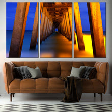 Load image into Gallery viewer, Pier Pillars Canvas Wall Art Yellow Pier Ocean Multi Canvas Artwork Blue Orange Under Pier  3 Piece Canvas Print In Living room
