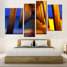 Load image into Gallery viewer, Pier Pillars Canvas Wall Art Yellow Pier Ocean Multiple Canvas Blue Orange Under Pier  4 Piece Canvas Print 
