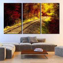 Load image into Gallery viewer, Railroad Tracks Into the Woods 3 piece canvas prints In Living Room
