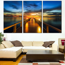 Load image into Gallery viewer, Sea Pier Canvas Wall Art Blue Sky Wooden Bridge Ocean  3 Piece Canvas Print Dramatic Yellow Sunset Sky Pier Multi Canvas In Living Room
