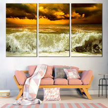 Load image into Gallery viewer, Seascape Storm Canvas Wall Art Dramatic Clouds Yellow Sunset Canvas Artwork Green Ocean Waves  3 Piece Canvas Print In Living Room
