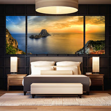 Load image into Gallery viewer, Seascape with sun setting behind Es Vedra in Ibiza 3 panel wall art In Bedroom
