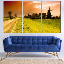 Load image into Gallery viewer, Sunset Windmill Canvas Wall Art Beautiful Orange Sky Netherlands Windmill Canvas Artwork Green Windmill Scenery  3 Piece Canvas In Living Room
