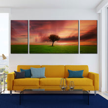 Load image into Gallery viewer, Triptych  Canvas  Alone  Tree  Green  Fields  at  Dusk In Living Room
