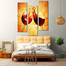 Load image into Gallery viewer, Two  red  Wine  Glasses  cheers  Against  orange  yellow  Background  3  panel  canvas  art For Bedroom
