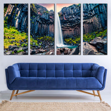 Load image into Gallery viewer, Waterfall Iceland Canvas Wall Art Orange Sunrise in Skaftafell Waterfall Canvas Print Europe Green Rocks Waterfall Scenery Canvas Set Vatnajokull National Park 4 Piece Multiple Canvas In Living room
