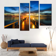 Load image into Gallery viewer, Wooden Pier Canvas Wall Art Orange Pier at Sea  4 Piece Canvas Dramatic Blue Yellow Sunset Sky Canvas Print
