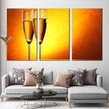 Load image into Gallery viewer, alcohol glasses canvas wall art yellow orange champagne glasses 3 piece multi canvas romantic champagne glasses triptych canvas print In Living Room
