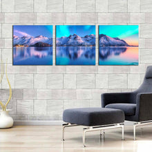 Load image into Gallery viewer, aurora  borealis  canvas  wall  art  northern  lights  white  mountain  ocean  multiple  canvas  blue  sky  lofoten  islands  sea  3  piece  canvas  print For Living Room
