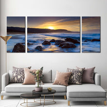 Load image into Gallery viewer, australia  ocean  canvas  wall  art  killcare  beach  blue  ocean  3  piece  canvas  print  yellow  sunset  ocean  rocks  triptych  multiple  canvas In Living Room
