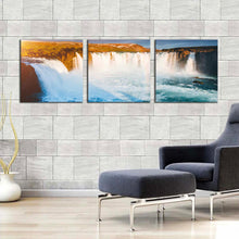 Load image into Gallery viewer, beautiful  waterfall  canvas  wall  art  yellow  godafoss  cascade  landscape  waterfall  canvas  print  europe  blue  waterfall  bardardalur  valley  3  piece  canvas  set In Living Room
