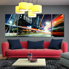 Load image into Gallery viewer, beautiful busy city traffic lights trail at night triptych canvas print In Living Room
