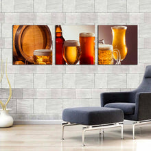 Load image into Gallery viewer, beer  glasses  canvas  wall  art  brown  beer  barrel  multi  canvas  artwork  yellow  beer  on  wooden  table  3  piece  canvas  print In Living Room
