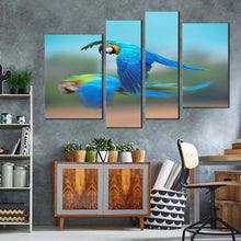 Load image into Gallery viewer, bird flying canvas print blue parrot flying 4 piece canvas wall art colorful exotic parrot canvas set in living room
