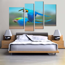 Load image into Gallery viewer, bird flying canvas print blue parrot flying 4 piece canvas wall art colorful exotic parrot canvas set
