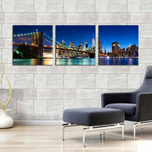 Load image into Gallery viewer, brooklyn  bridge  canvas  print  black  new  york  city  skyline  multi  canvas  blue  manhattan  sky  3  piece  canvas  wall  art  beautiful  nyc  night  canvas  set In Living Room
