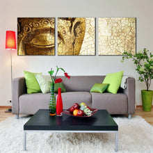 Load image into Gallery viewer, buddha  statue  canvas  print  yellow  buddha  meditation  statue  canvas  set  yellow  peaceful  buddha  close  up  3  piece  canvas  wall  art In Living Room
