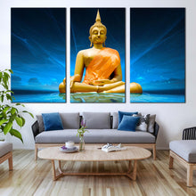 Load image into Gallery viewer, buddha statue canvas wall art blue lighting background gold buddha 3 piece canvas print big yellow lord buddha triptych multiple canvas For Living Room
