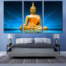 Load image into Gallery viewer, buddha statue canvas wall art blue lighting background gold buddha 3 piece canvas print big yellow lord buddha triptych multiple canvas For Bedroom
