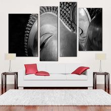 Load image into Gallery viewer, buddha statue canvas wall art grey buddha close up 4 piece canvas print black and white big buddha multi canvas in living room
